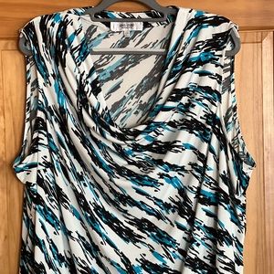 Women’s plus size top. Beautiful alone, or under your favorite jacket.